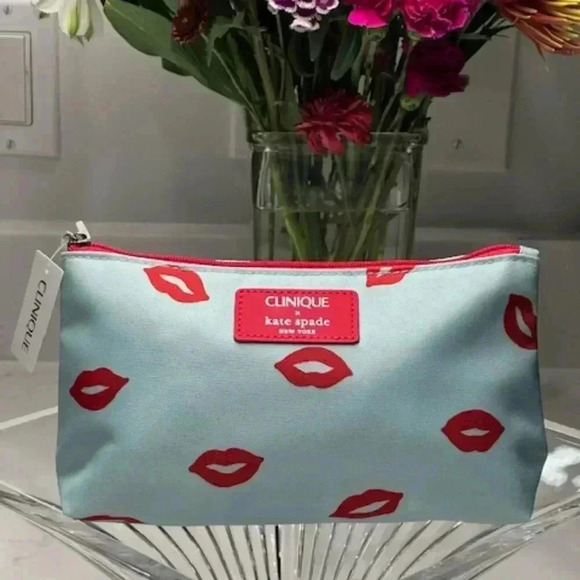 Kate Spade and Clinique Handbags - Kate Spade Clinique Blue Red Lip Cosmetic Makeup Bag NWT!